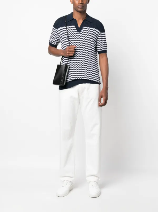 white and brown polo
