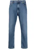 Calvin Klein logo-patch mid-rise tapered jeans - Blue