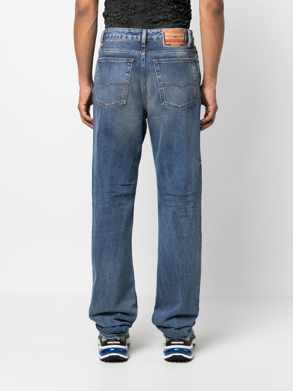 Shop Diesel Logo-patch Stonewashed Jeans In Blue