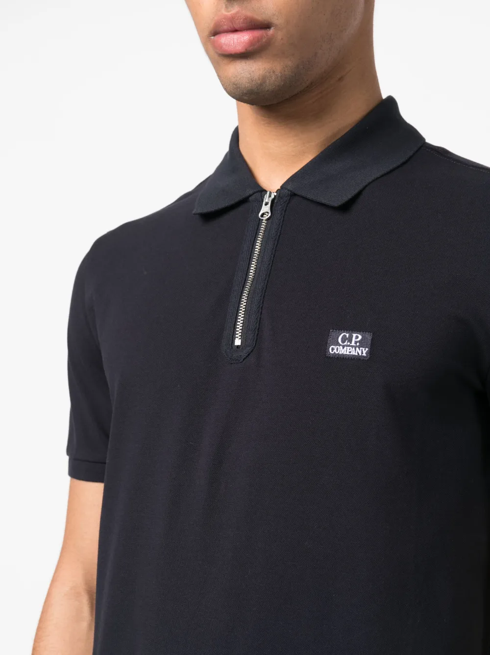 Cp company on sale black polo shirt