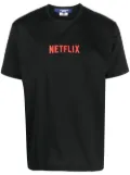 Junya Watanabe MAN Netflix-print cotton T-shirt - Black
