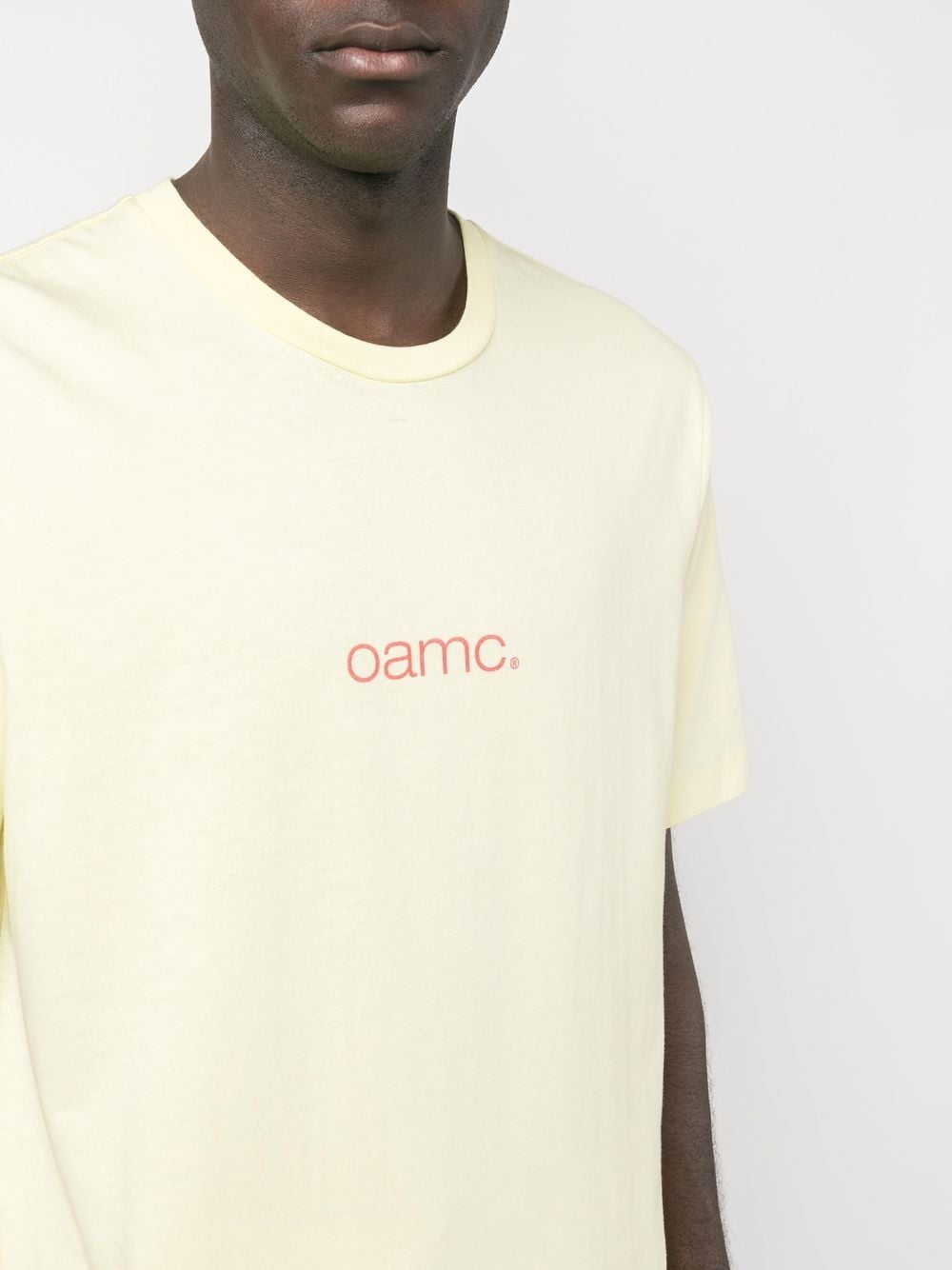 Shop Oamc Logo-print Cotton T-shirt In Gelb