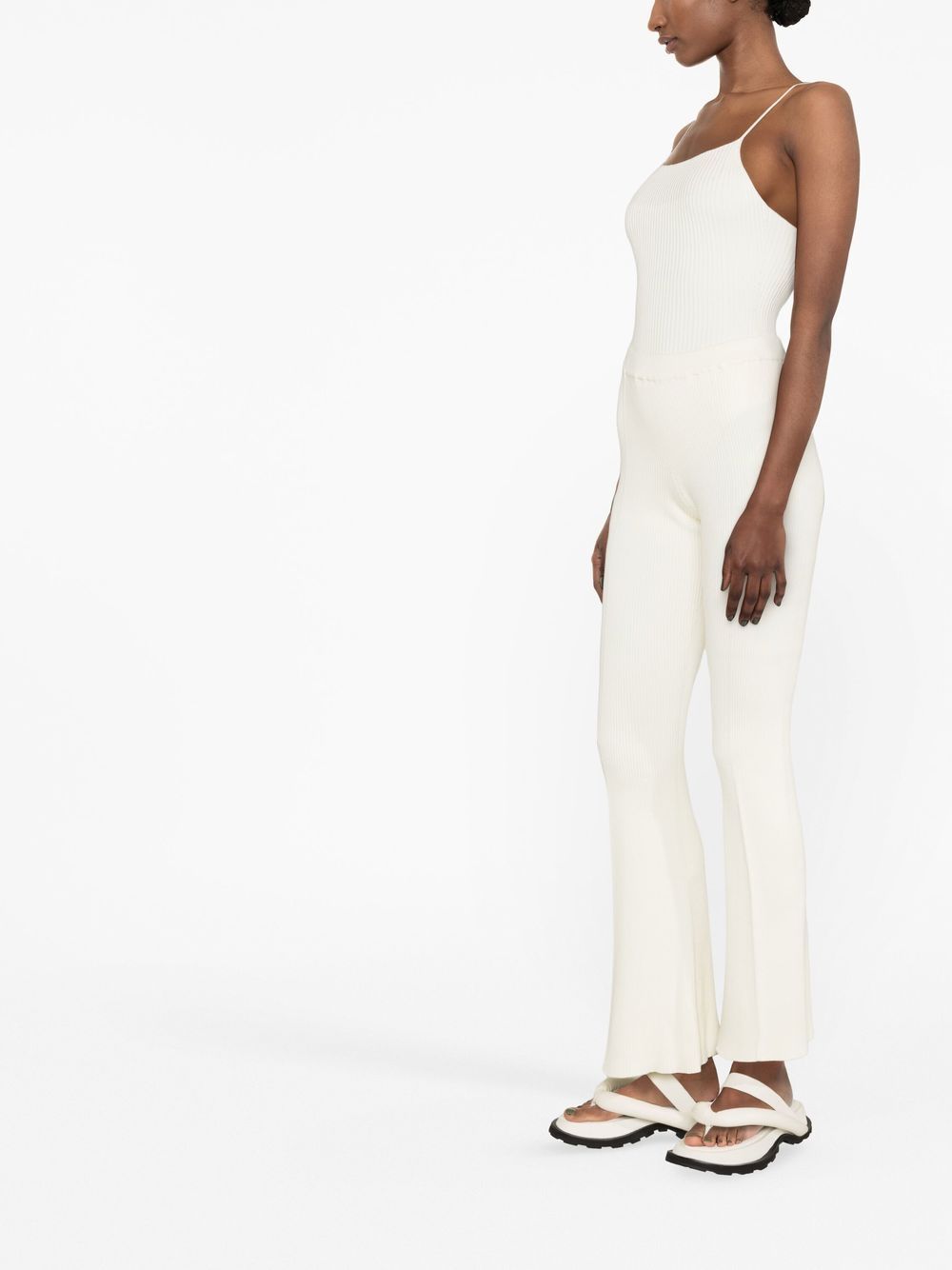 Shop Aeron Ribbed-knit Sleeveless Bodysuit In White