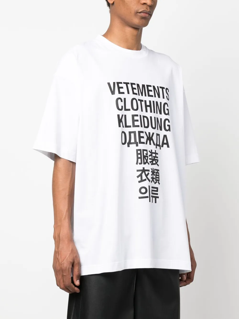 VETEMENTS Translation Print short-sleeve T-shirt - Farfetch