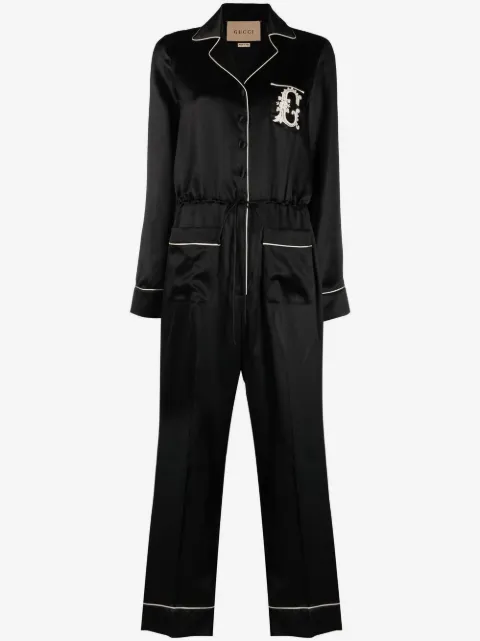 Gucci jumpsuit con logo bordado