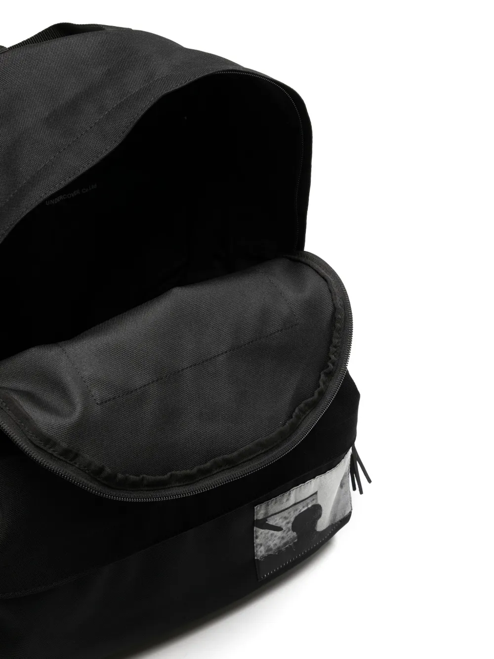 Undercover Graphic patches Backpack Farfetch undercover-graphic-patches-backpack-farfetch