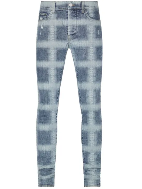 AMIRI logo plaid-print skinny jeans