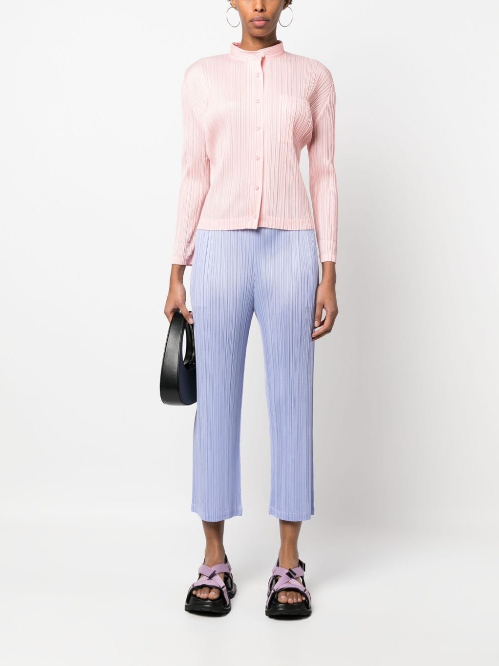 Shop Issey Miyake Pleated Tapered Pants In Purple
