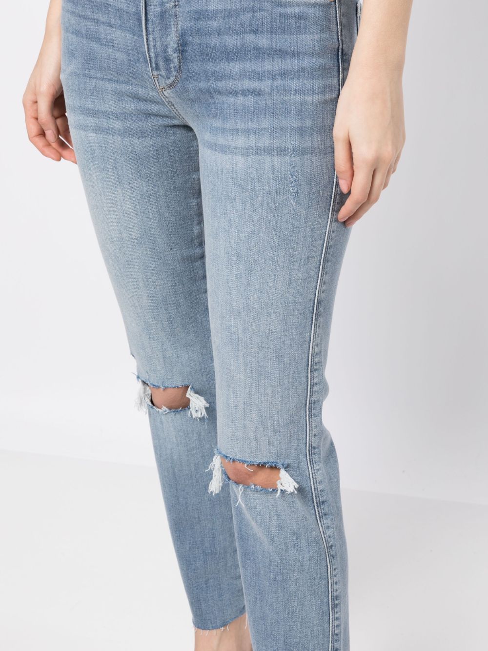 Shop Frame Ripped-knee Cropped Jeans In Blue