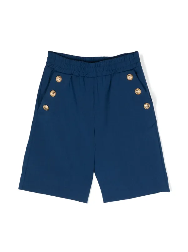 Shorts with buttons on on sale side