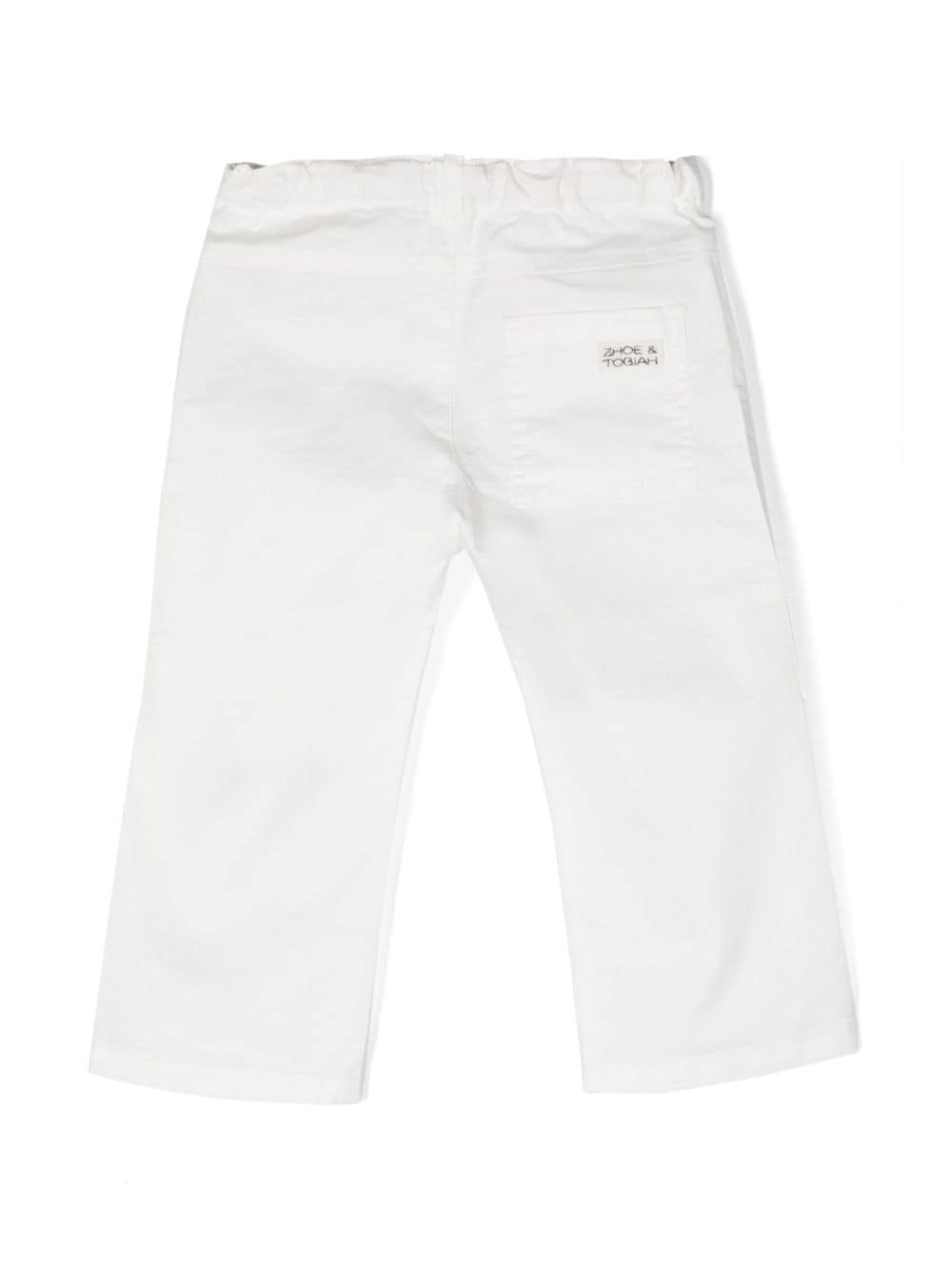Shop Zhoe & Tobiah Logo-detail Cotton Trousers In White