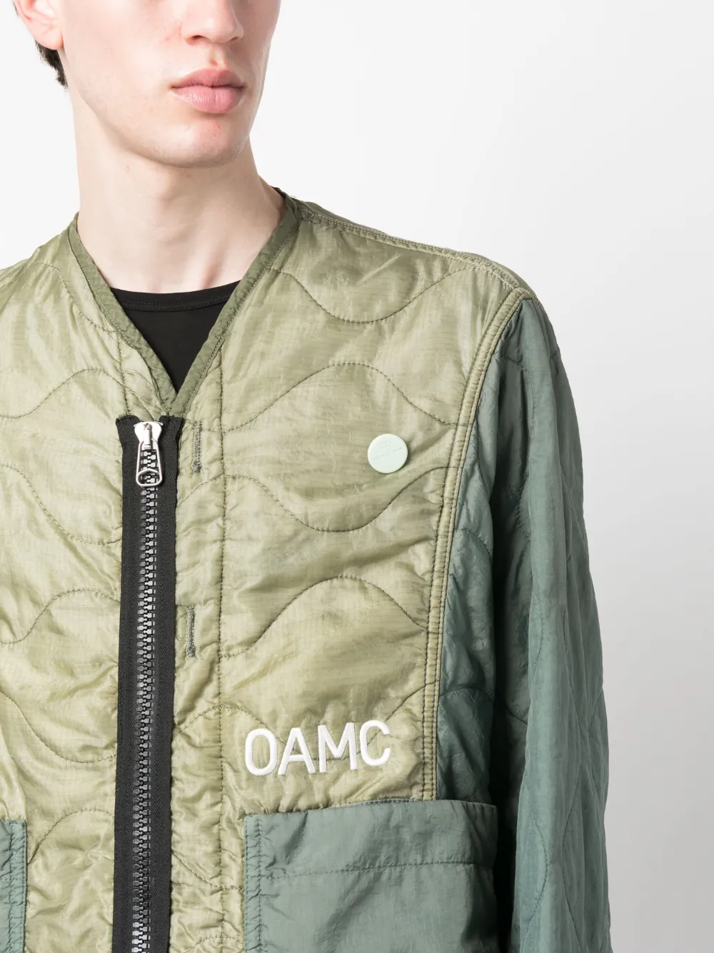 Shop Oamc Re:work Contrast-sleeve Embroidered Padded Jacket In Grün