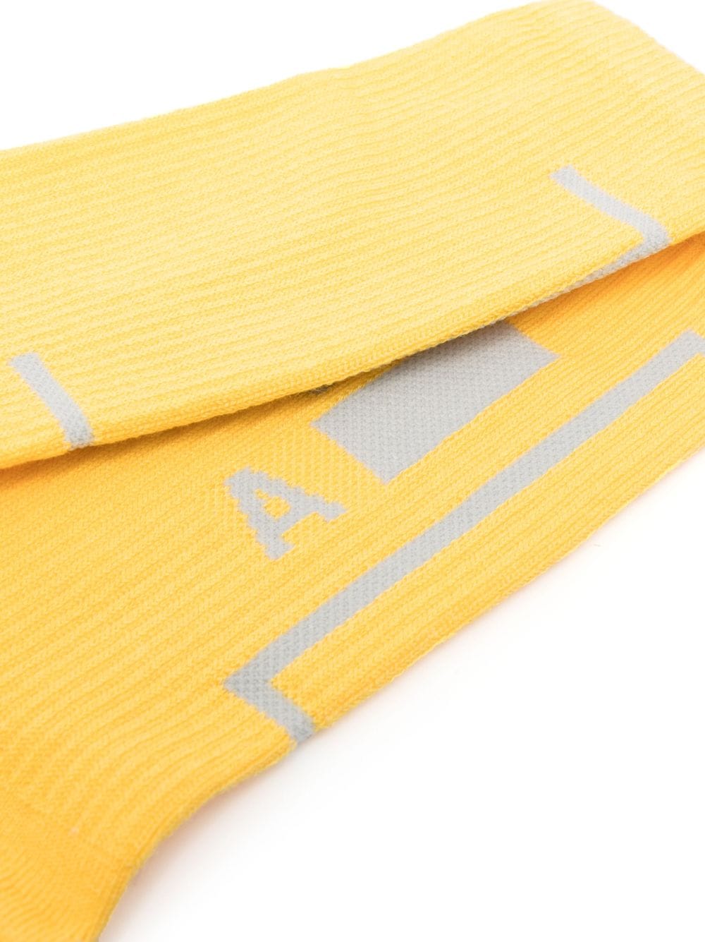 Shop A-cold-wall* Logo-print Cotton Socks In Yellow