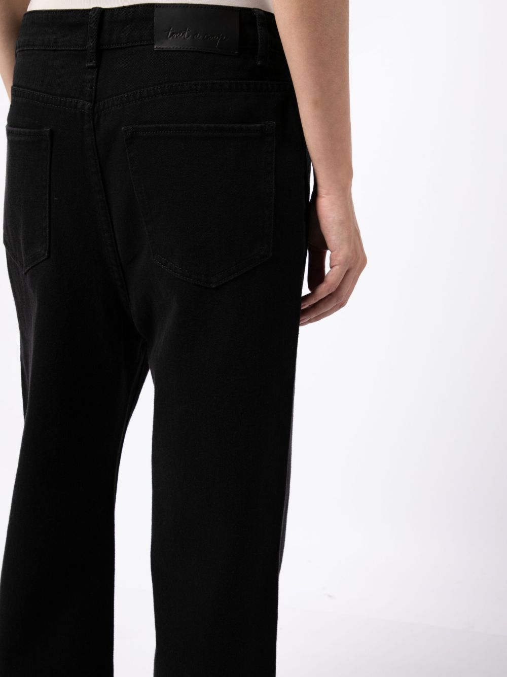 Shop Tout A Coup Mid-rise Bootcut Jeans In Black