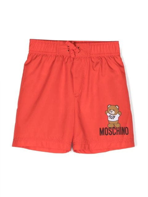 Moschino Kids logo-print swim trunks