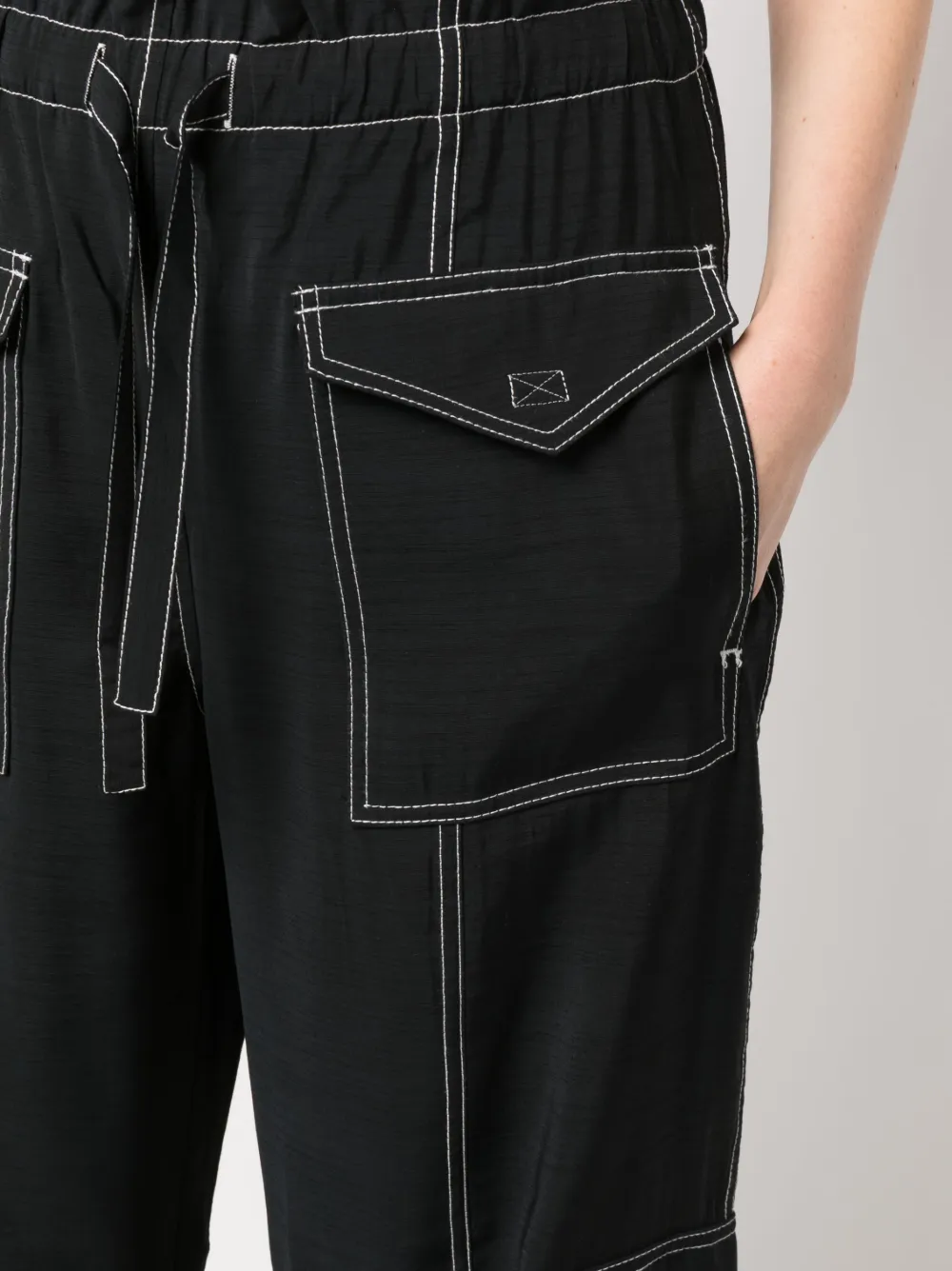 Shop Ganni Topstitch Cargo Trousers In Schwarz