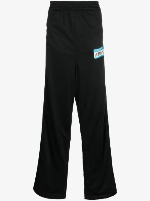 VETEMENTS pantalones anchos con logo estampado