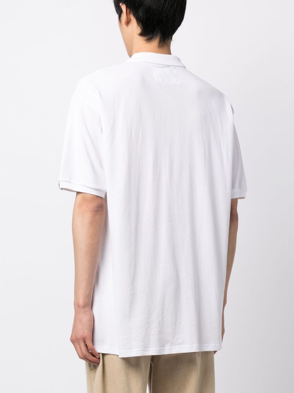 Shop Izzue Embroidered-logo Polo Shirt In White
