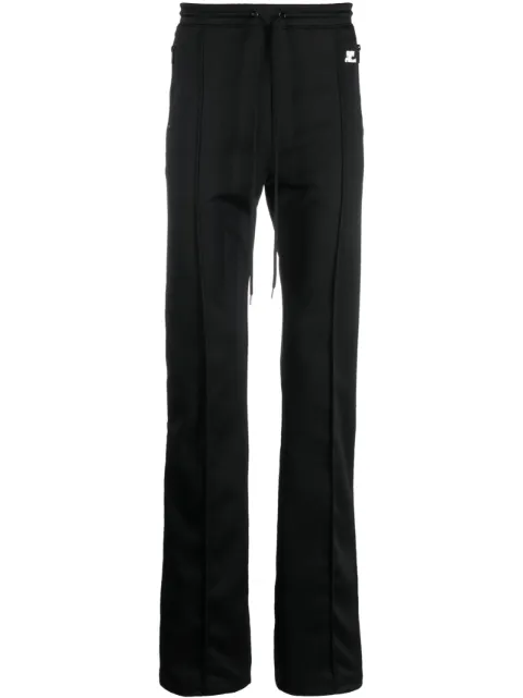 Courrèges pantalones con parche del logo