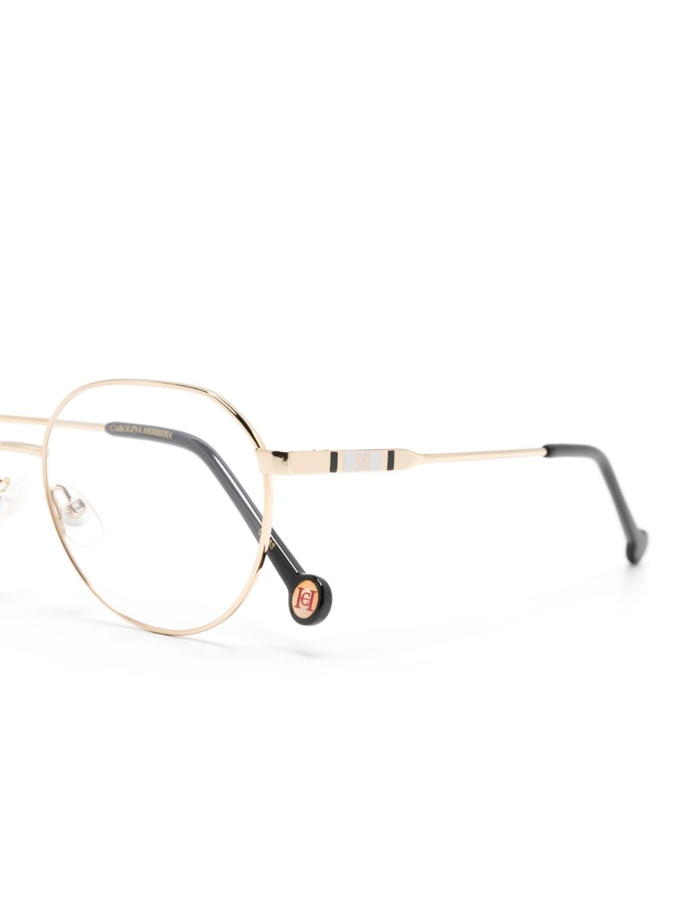 Shop Carolina Herrera Engraved-logo Round-frame Glasses In Gold