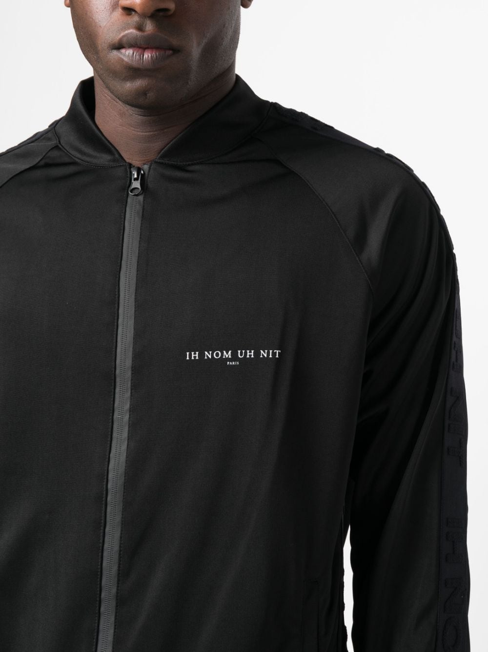 Shop Ih Nom Uh Nit Rear Graphic-print Zip-up Jacket In Schwarz