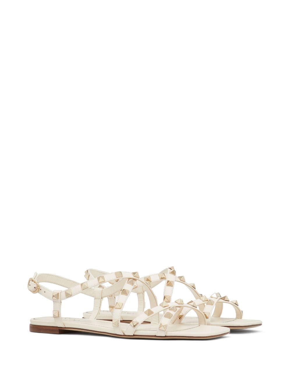 Shop Valentino Rockstud Flat Leather Sandals In White