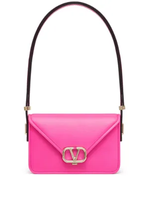 Pink valentino deals clutch bag