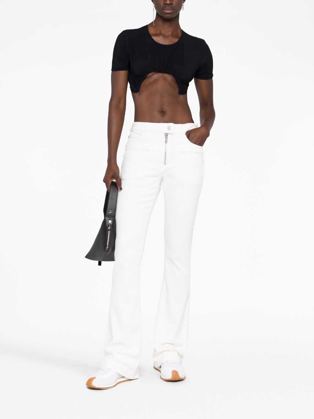 Shop Courrèges Low-rise Bootcut Jeans In White