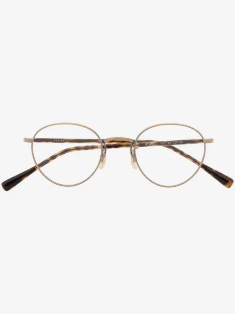 Eyevan7285 lunettes de vue rondes à effet écailles de tortue