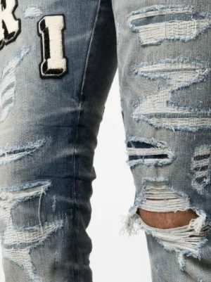 Varsity ripped skinny jeans 6