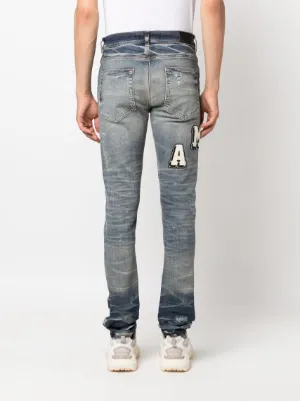 Varsity ripped skinny jeans 5
