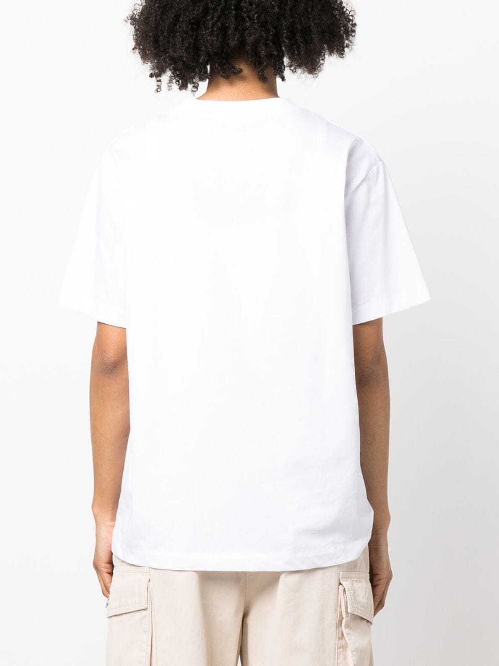 Shop Moschino Graphic Logo Print T-shirt In White