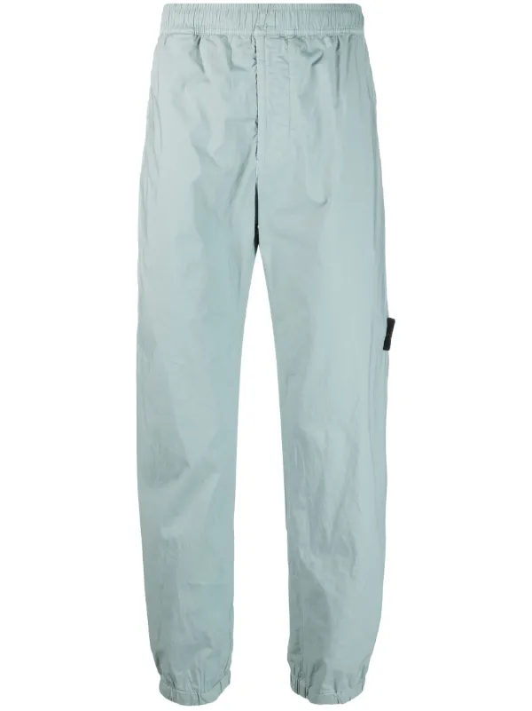 Stone Island コンパスパッチ トラックパンツ | ブルー | FARFETCH JP