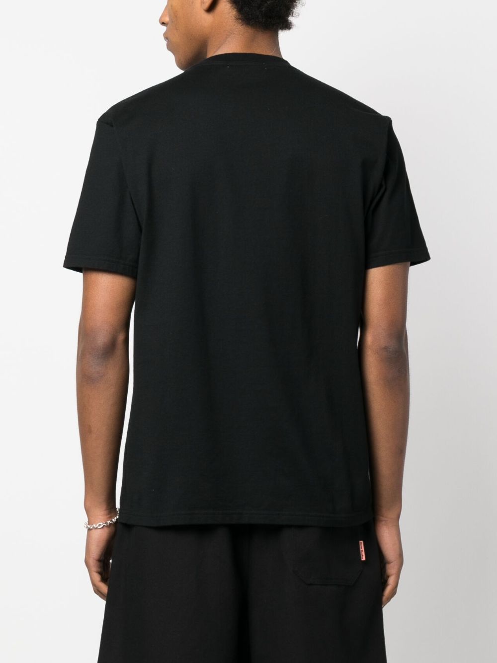 Shop Undercover Slogan-print Cotton T-shirt In Black