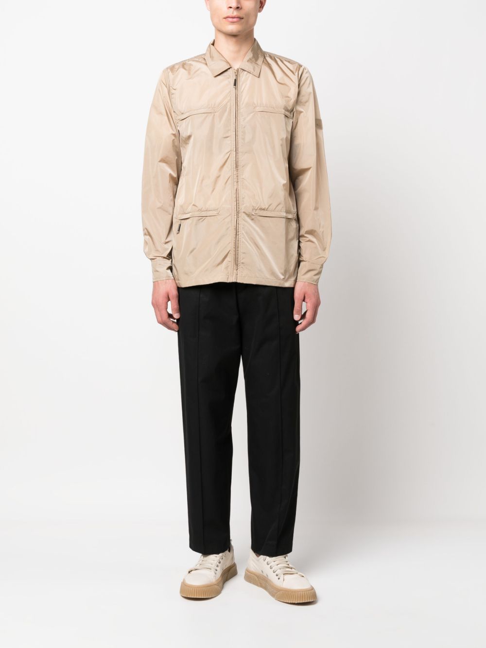 Rains multiple-pocket zipped lightweight jacket - Beige