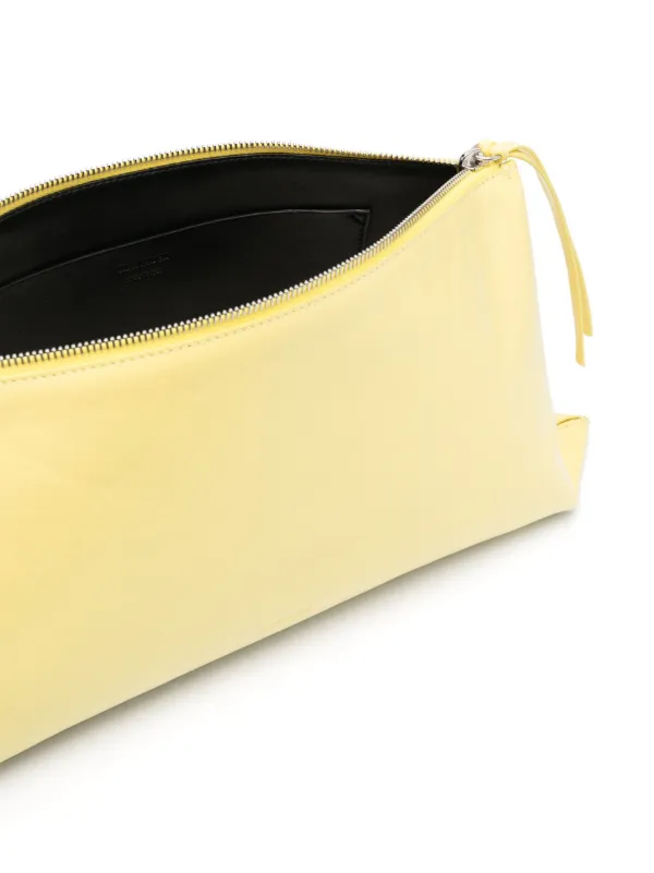 Jil Sander ロゴエンボス クラッチバッグ | イエロー | FARFETCH JP