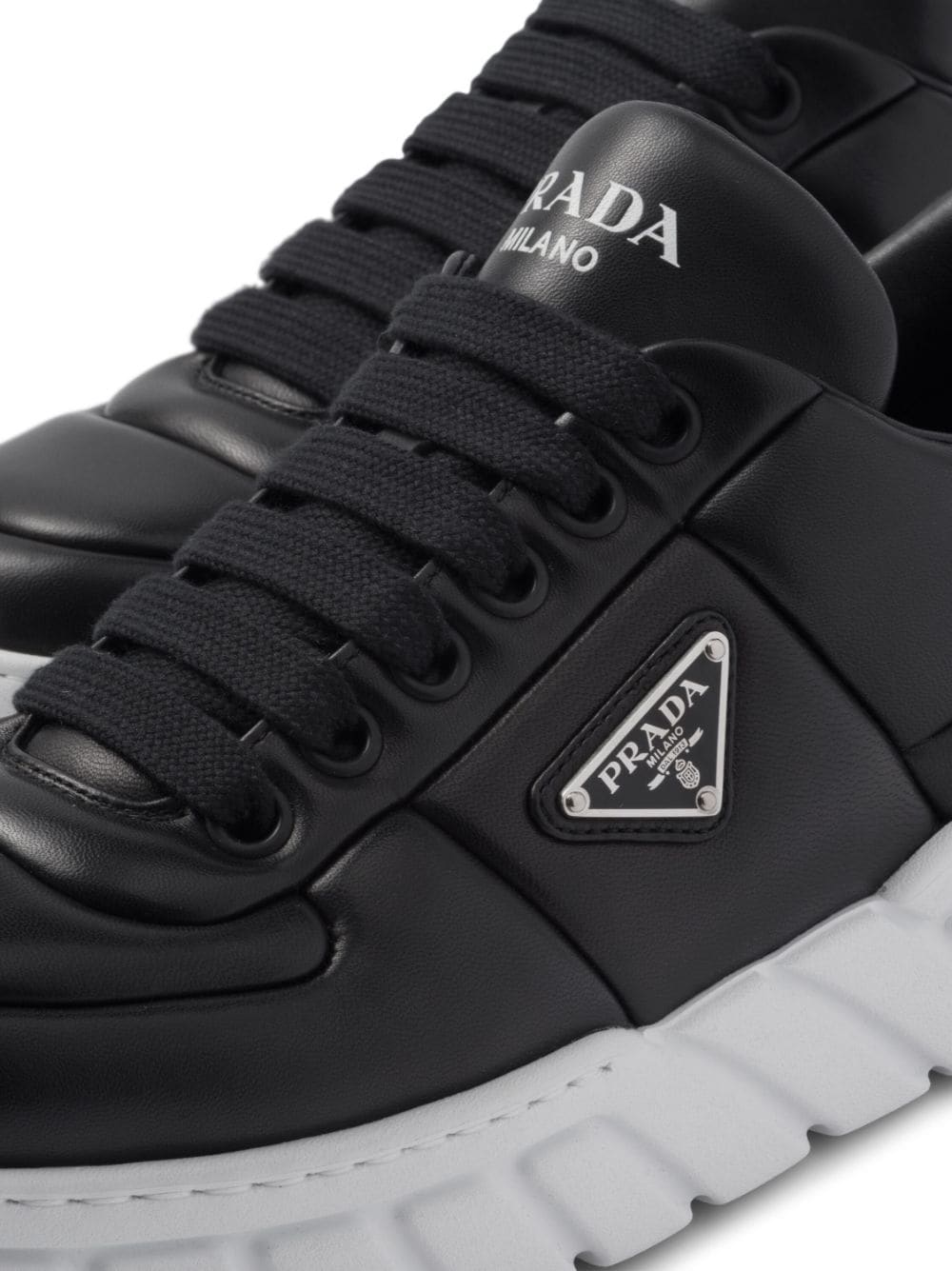 Shop Prada Padded Leather Sneakers In Black