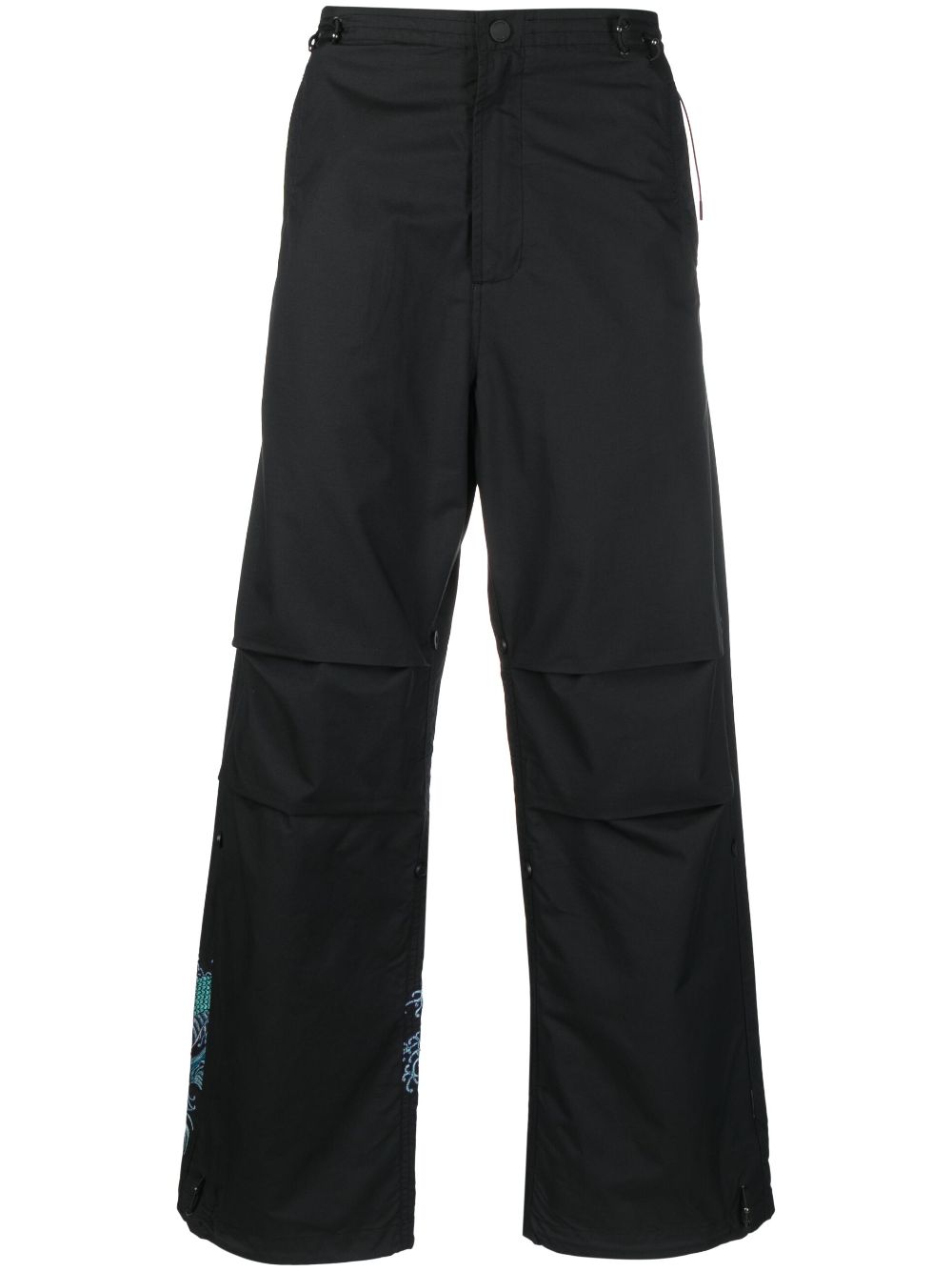 Maharishi graphic-print trousers - Black