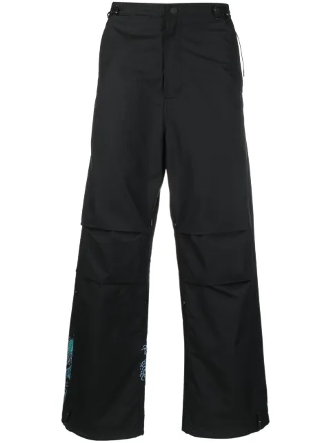 Maharishi graphic-print trousers
