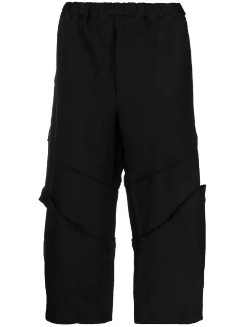 Black Comme Des Garçons cropped frayed trousers