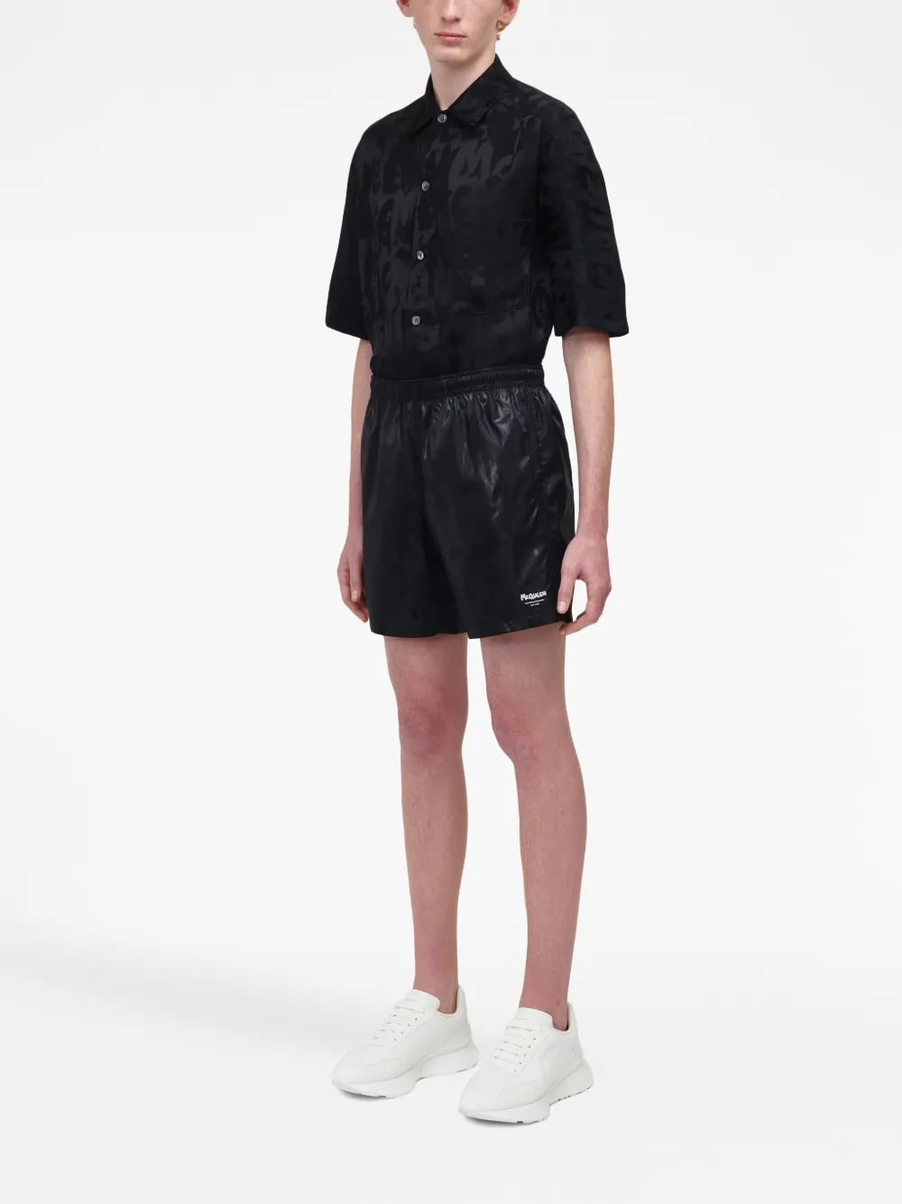 Alexander Mcqueen Solid Color Swim Shorts With Graffiti Print In Black