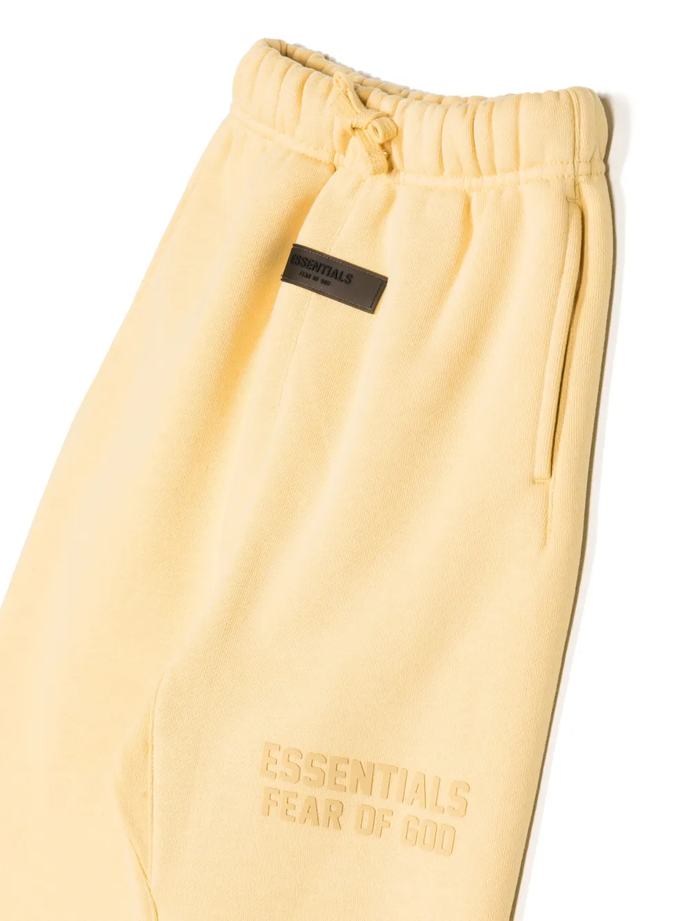FEAR OF GOD ESSENTIALS KIDS Trainingsbroek met logoprint Geel