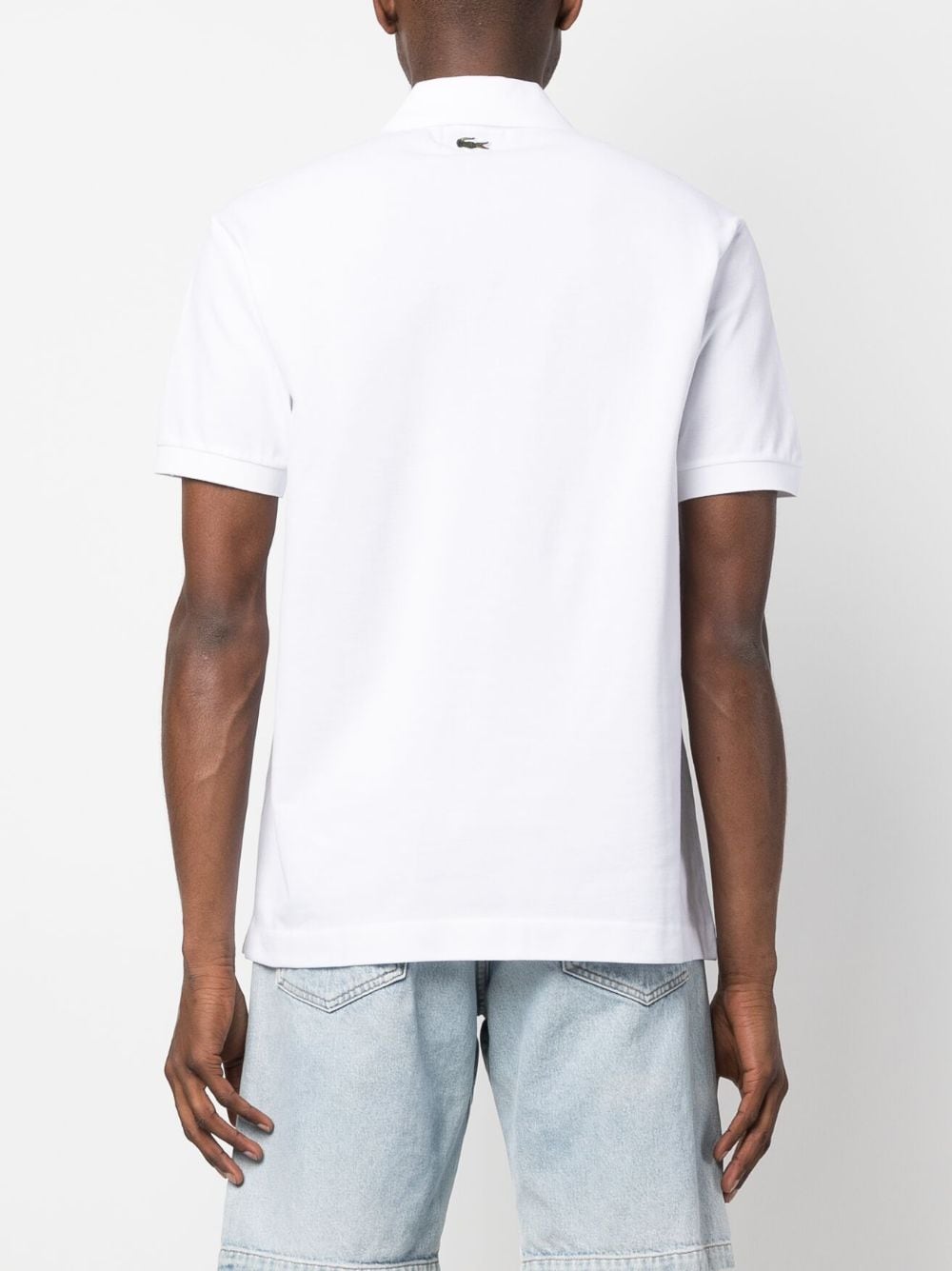 Shop Lacoste X Netflix Cotton Polo Shirt In White