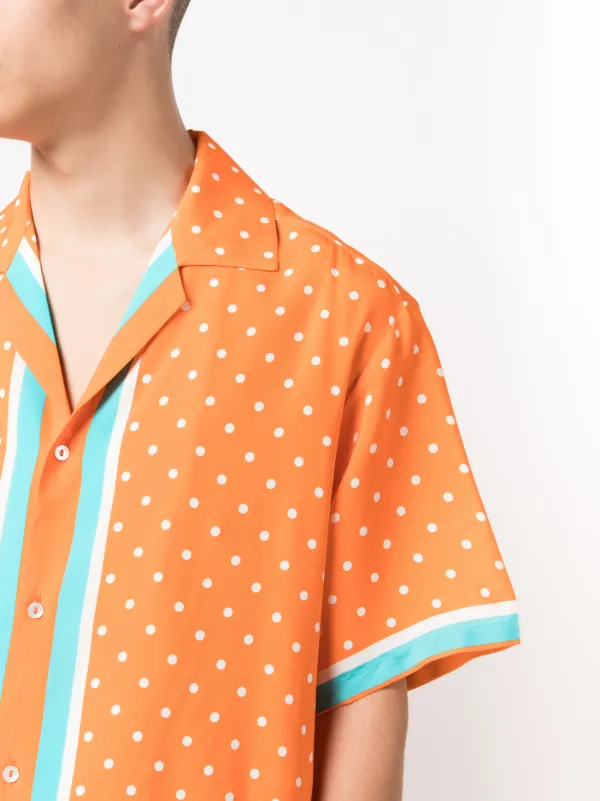 orange polka dot shirt