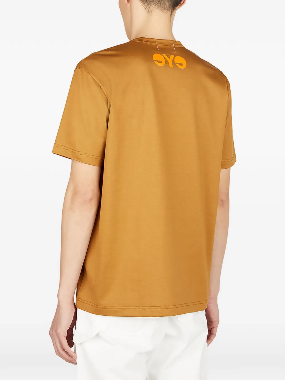 Junya Watanabe MAN x Carhartt T-shirt met print Bruin