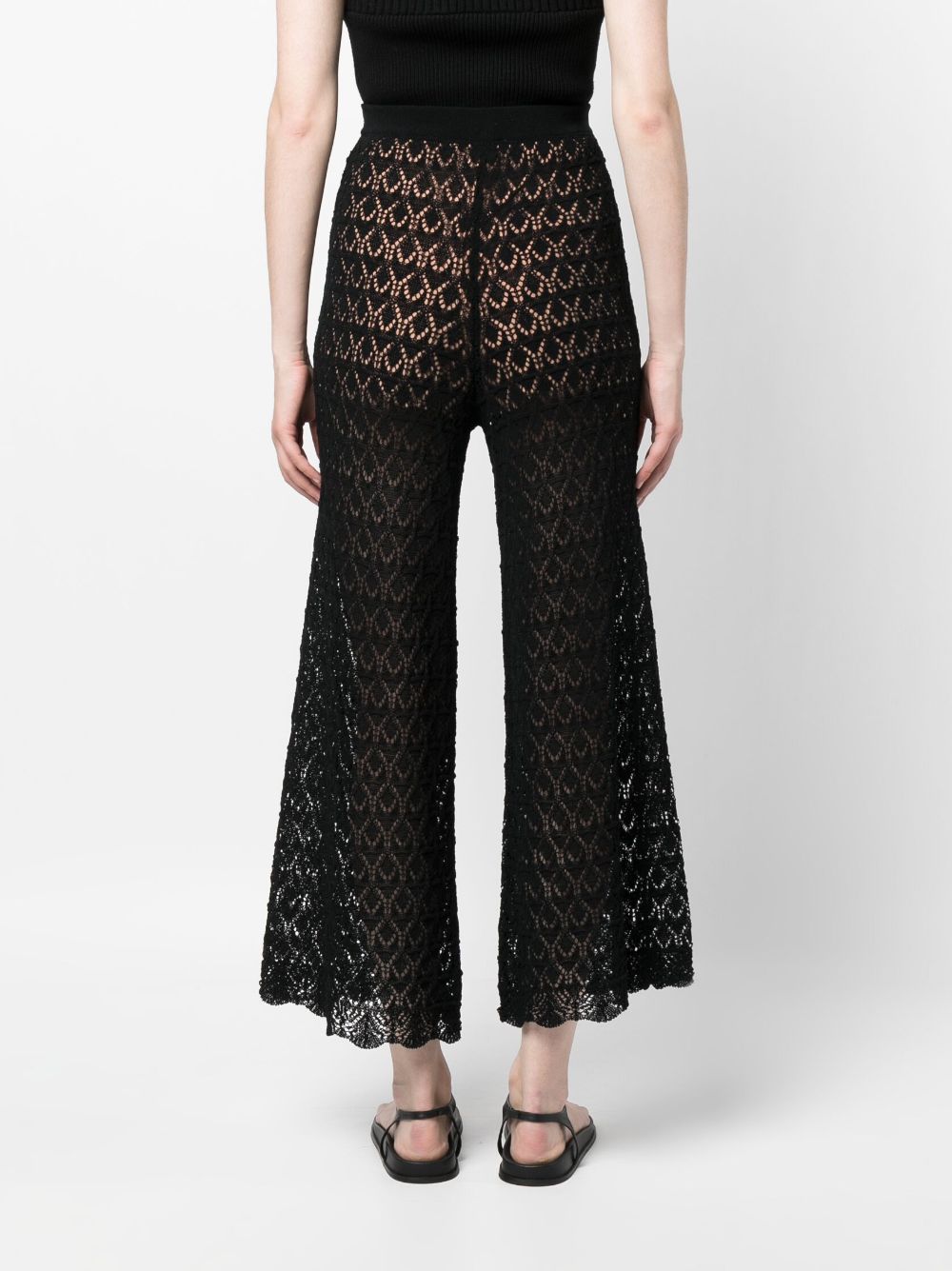 Shop Liu •jo Open-knit Flared Cropped Trousers In Black