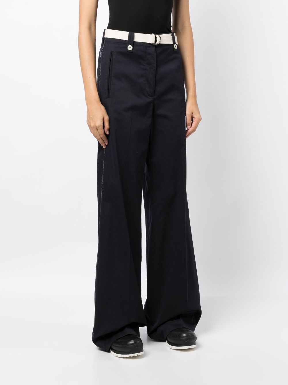 Shop Moncler High-waisted Flared Trousers In Black