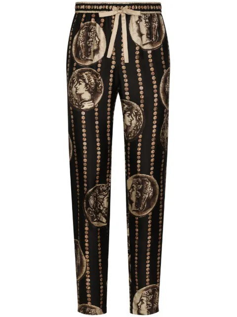 Dolce & Gabbana Calça de seda com estampa de moeda 