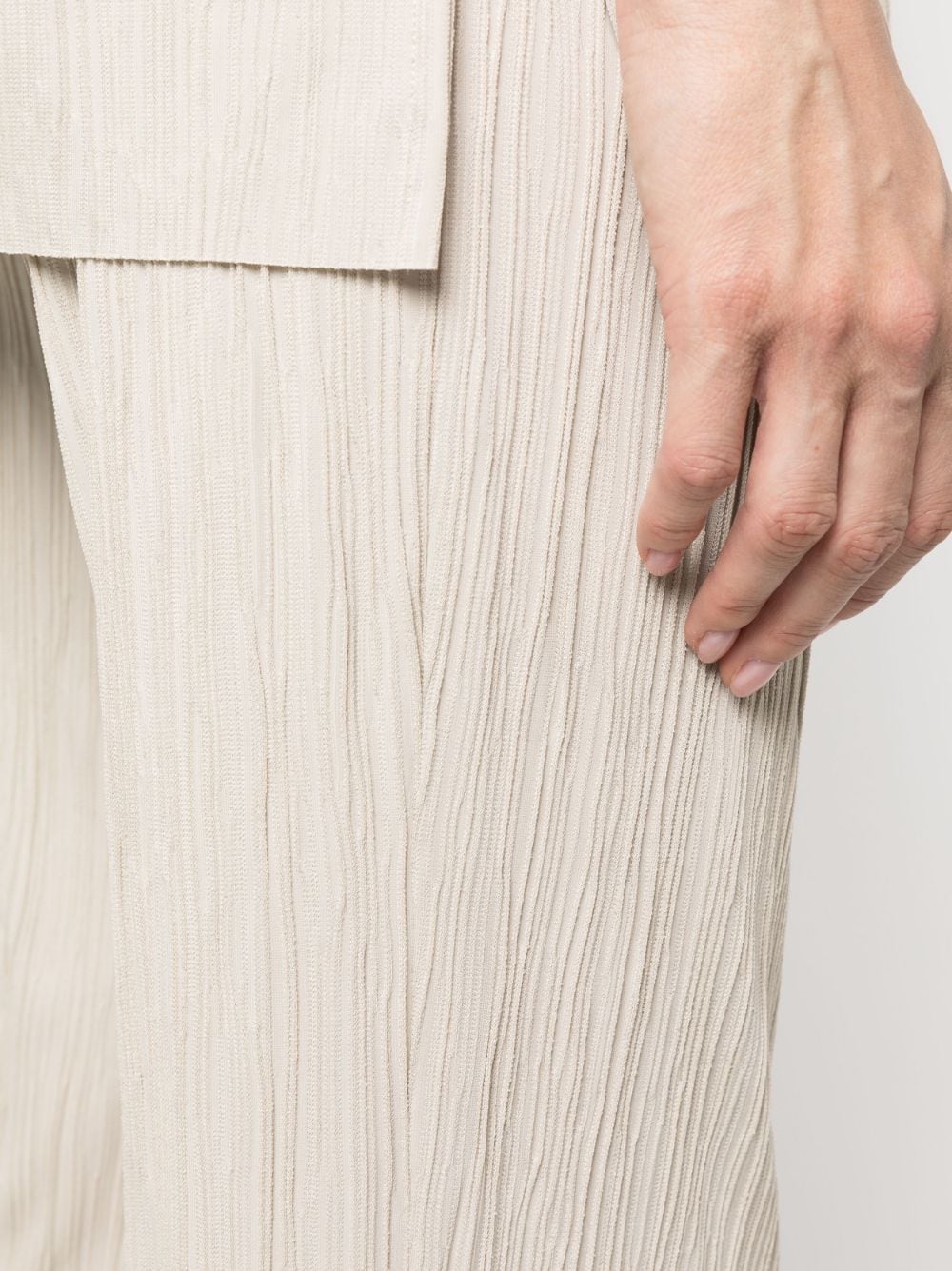 Shop Le Tricot Perugia Pleated Mid-rise Trousers In Neutrals