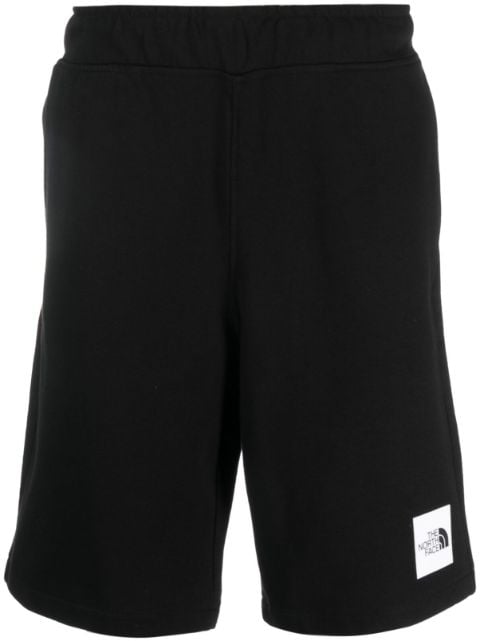 The North Face shorts deportivos con parche del logo